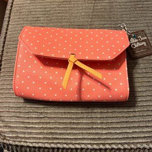 coral and white polka dot clutch with detachable strap
